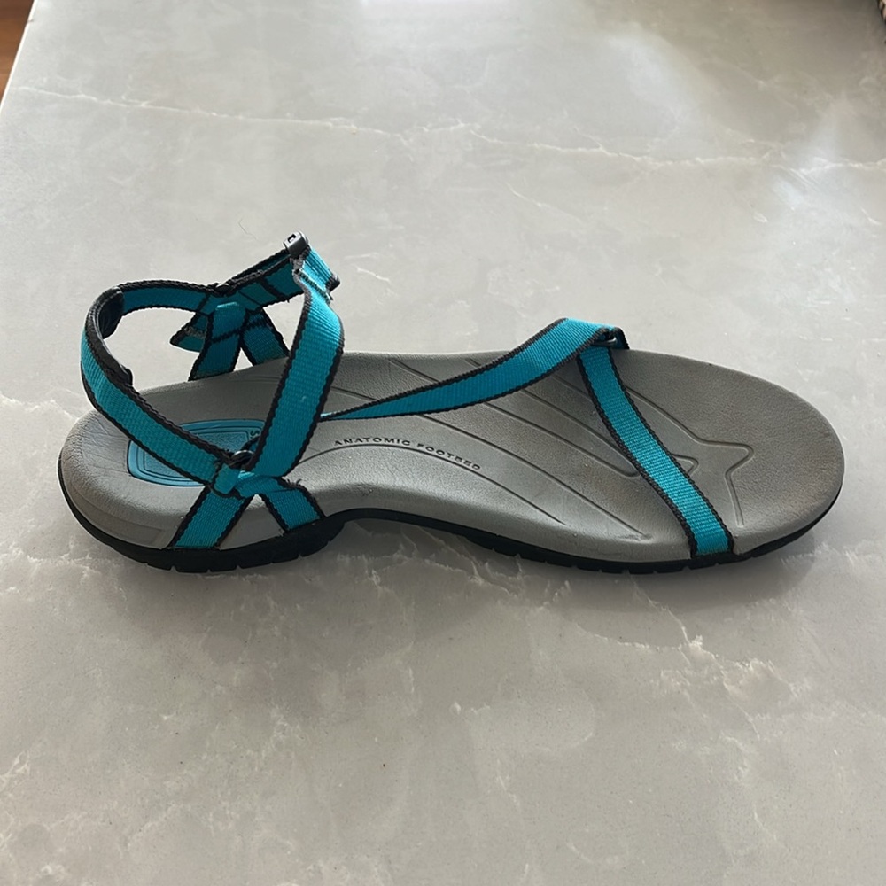 Teva sandals. With teal straps. In very good uses condition. Size 8.5